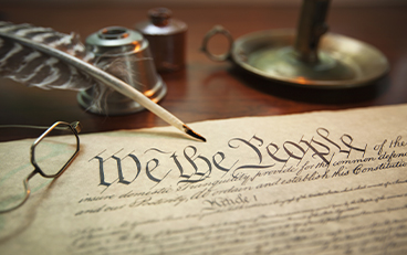 U.S. constitution sitting on a desk